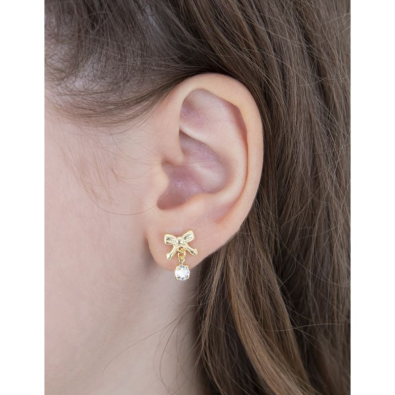 BRINCO INFANTIL LACINHO COM PEDRA CRAVEJADA EM ZIRCÔNIA BANHADO EM OURO