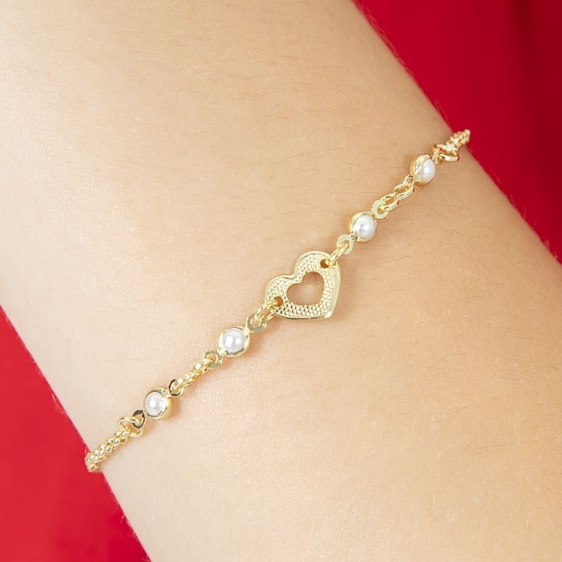 PULSEIRA INFANTIL DE CORAÇÃO VAZADO COM PÉROLAS NAS LATERAIS
