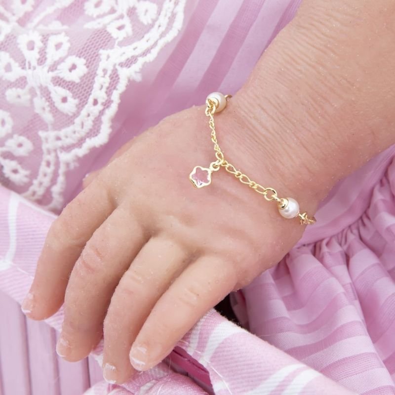 PULSEIRA BEBÊ PÉROLA COM FLORZINHA BANHADO EM OURO